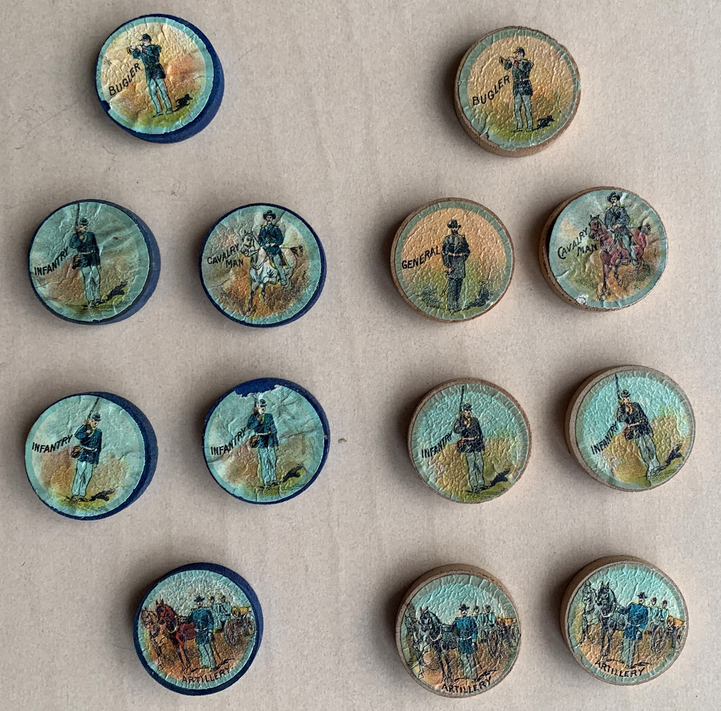 Colored wooden playing pieces with military figures