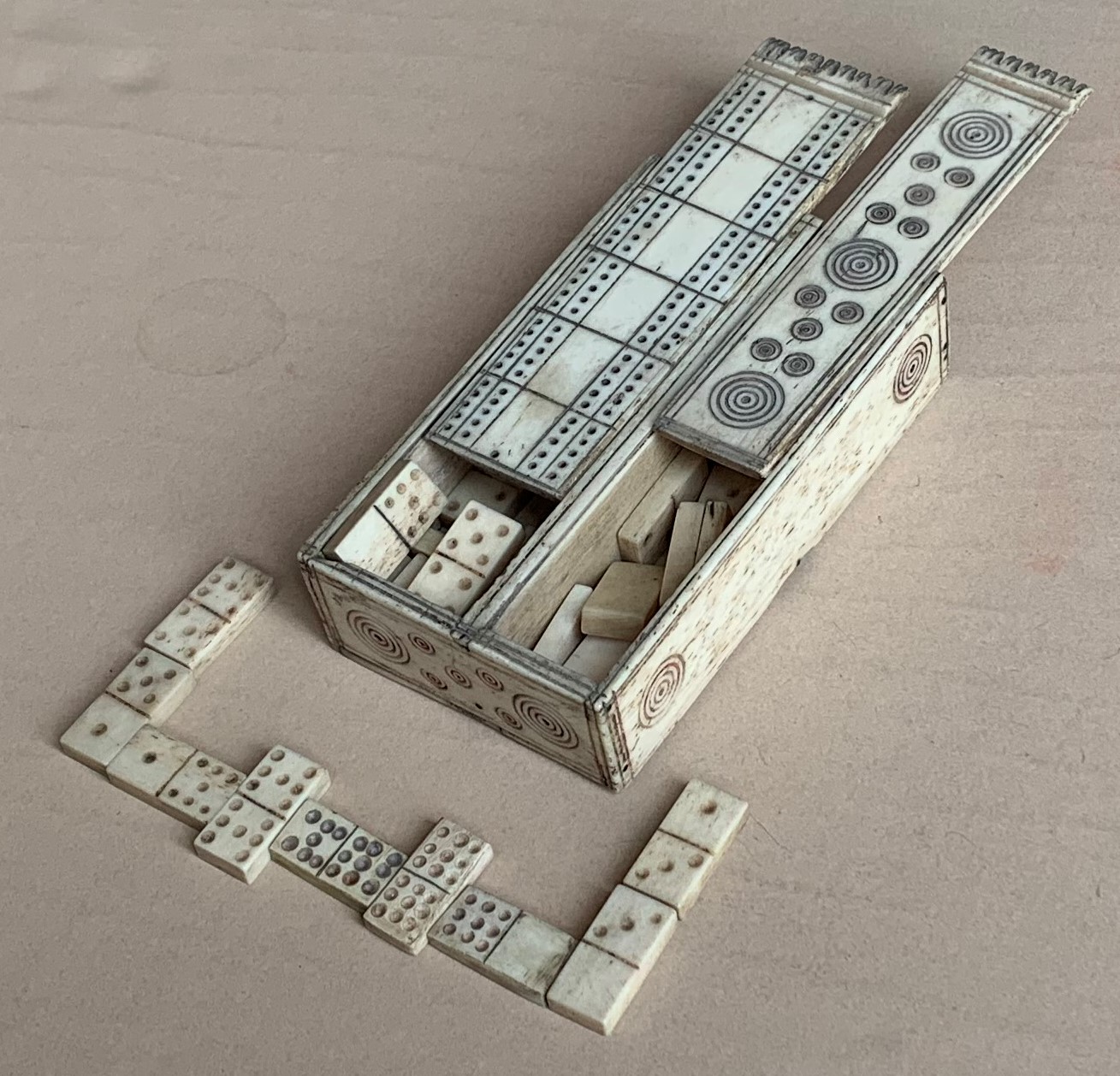Bone dominoes and carved box made by a Napoleonic prisoner of war