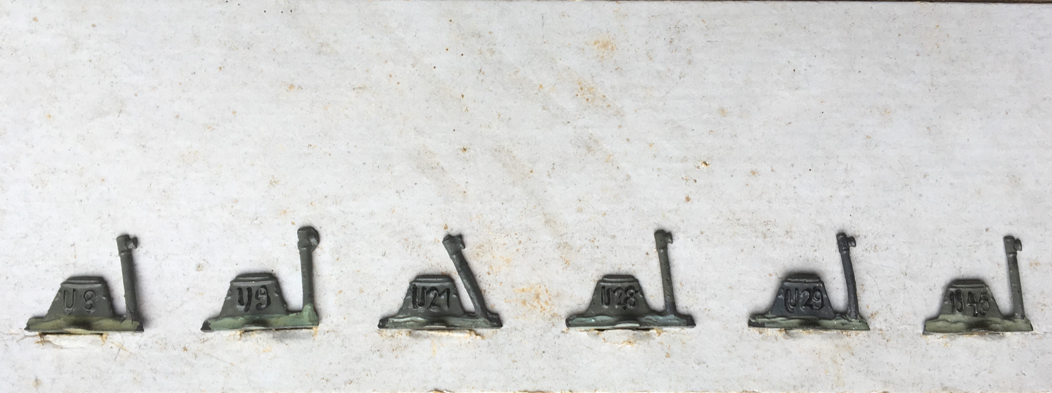 Numbered metal U-boat playing pieces